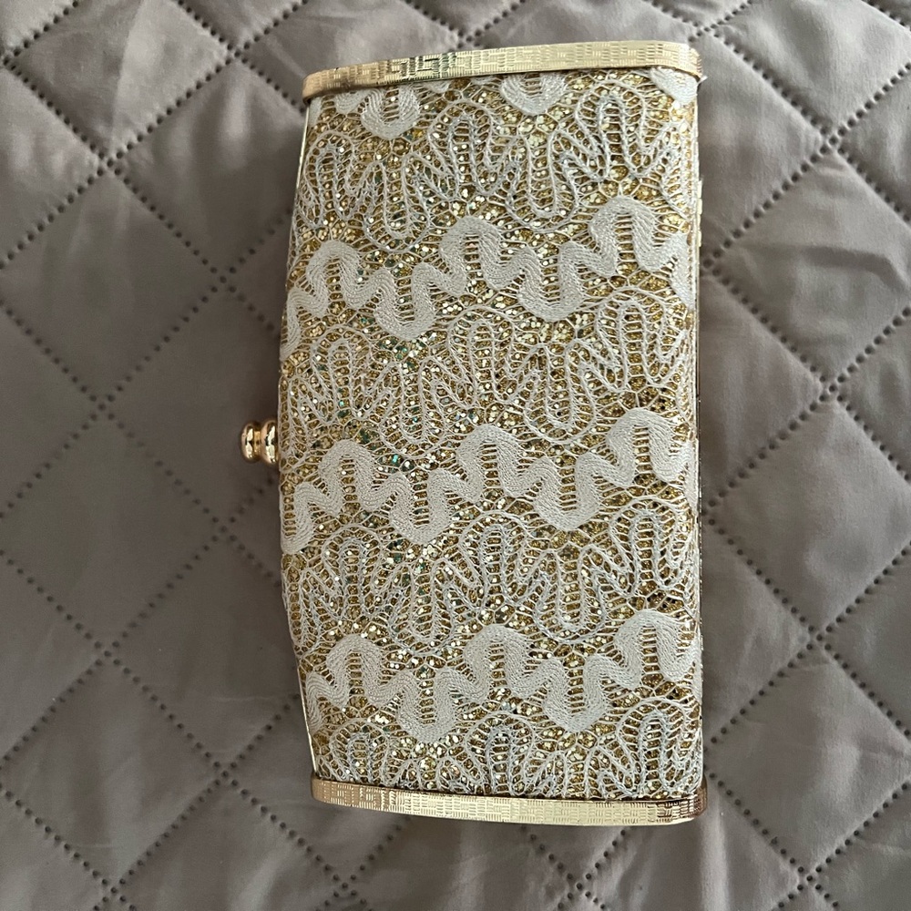 Elegant Gold and Cream Clutch